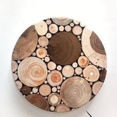 a plate made out of tree slices on a white background with text overlay that says, wood art