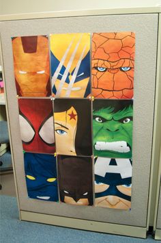 an office cubicle decorated with avengers and spider - man faces on the doors,