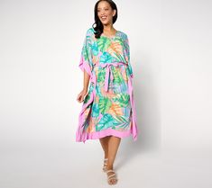 Look resort-ready in this flowing caftan. You'll be the belle of the beach when you show up in this tropical-printed cover-up. Pair it with some strappy sandals for a dockside dinner. From Denim & Co.® Fashions. Flowy Kaftan For Spring Vacation, Tropical Printed Flowy Beach Dress, Tropical Flowy Printed Beach Dress, Beachy Kaftan For Spring Vacation, Beachy Spring Kaftan For Vacation, Flowy Tropical Beach Dress For A Day Out, Tropical Beach Dress For Day Out, Upf 50+ Spring Vacation Dresses, Flowy Beach Dress For Loungewear