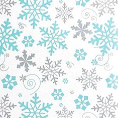 blue and white snowflakes are arranged on a white paper background with swirls