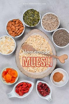 the ingredients for homemade muesli are arranged in bowls