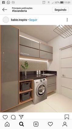 an image of a laundry room with washer and dryer on the left side