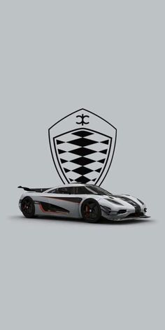 a black and white sports car in front of a shield logo on a gray background