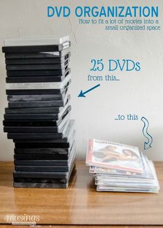 a stack of dvds sitting on top of a wooden table