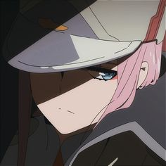 an anime character with pink hair and blue eyes wearing a fedora, looking at the camera