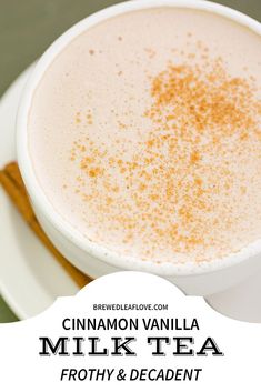 a cup of cinnamon vanilla milk tea on a white plate