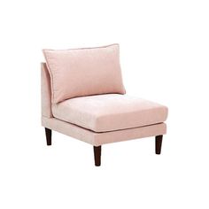 a pink chair sitting on top of a white floor