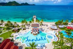 an aerial view of the resort and beach