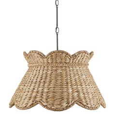 a woven light fixture hanging from a chain