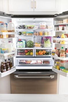 an open refrigerator filled with lots of food