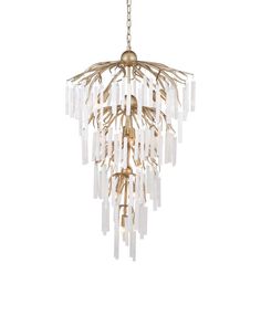 a chandelier hanging from a chain with white and gold leaves on the bottom