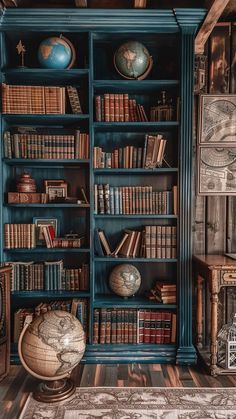 an old bookcase with many books and globes on it in a living room