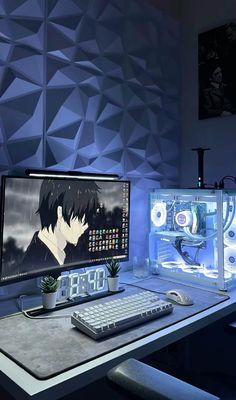 a desktop computer sitting on top of a desk next to a keyboard and monitor screen