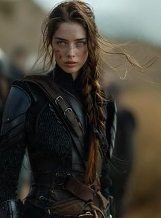 a woman with long hair wearing armor and braids