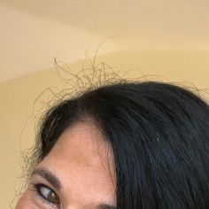 a close up of a woman with black hair