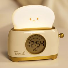 an alarm clock with a face on it