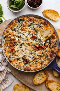 a casserole with spinach, cheese and bread