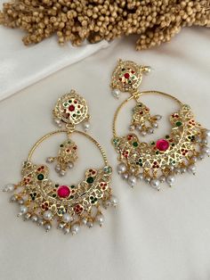 traditional punjabi jadau earrings . It's lightweight. Suitable for any occasion like wedding, engagement, birthday party or great for gifts.  Style tip- ----------- Pair it with any beautiful traditional outfits  and flaunt with Unique style of collection from us. Perfect match for Festival and Traditional wear.  Take Care Tips-  ---------------- Kee away from perfume, Hair spray and. Moisture.  Store in dry place , Ziplock bag or Airtight box.    Clean with dry cloth.  Jewellery is the last th Traditional Hand Set Kundan Pearl Earrings, Traditional Kundan Pearl Drop Earrings, Jadau Jewellery Traditional Gold, Pankhi Set Jadau, Festive Kundan Teardrop Earrings, Jadau Earrings, Cloth Jewellery, Jewelry Kundan, Kundan Jewelry