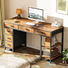 a wooden desk with drawers and a computer on it in front of a window next to a potted plant