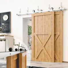 an open sliding barn door in a living room