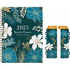 two notebooks with flowers on them next to each other, one is blue and the other has white flowers