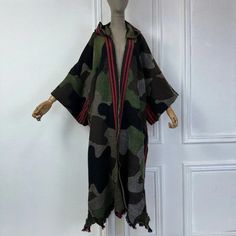 This super soft and warm wool cardigan kimono is perfect for the cold weather. Unlike other sweaters and wools, the wool used for this beauty is non itchy. Think of your favorite throw blanket, the comfort and warmth it gives but 10x stylish and wearable any where. This kimono is all that and more! One size fits S-4X Hooded Material: Wool One Size Fits Most Size Chart Oversized Camouflage Winter Outerwear, Fall Patchwork Long Kimono, Printed One-size Kimono For Fall, Camo Kimono, One-size Long Kimono For Loungewear, Kimono Street Style, Wool Kimono, Long Down Coat, Cardigan Dress