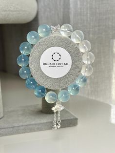 This bracelet is made with gradient Aquamarine. Aquamarine is known for its calming and soothing energy, promoting emotional clarity and reducing stress. It enhances clear communication, supports self-expression, and encourages trust and courage. Additionally, Aquamarine is believed to aid in spiritual growth, intuition, and the alignment of the mind and emotions. Bead size is 12mm, custom wrist size is 17cm. Aquamarine Bracelet, Clear Communication, Aquamarine Jewelry, Spiritual Growth, The Mind, Aquamarine, Halloween Shopping, New Zealand, Accessory Gift