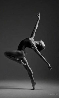 black and white photograph of a woman in ballet pose