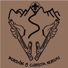 two crossed skis with the words born and questa nuval on them, in front of a brown background