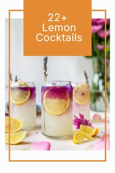 two lemon cocktails in glasses with lavender and orange garnish