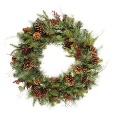 a christmas wreath with pine cones and berries