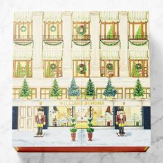 a christmas card with an image of a store front