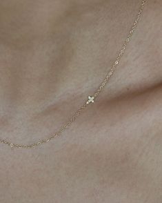 This simple cross necklace is both understated and significant, perfect for daily wear and layering with other necklaces. Ideal for a confirmation or baptism present, this minimalistic necklace features a delicate chain and a sparkling diamond charm, symbolizing faith. • Mini Cross measures 4x5mm• 14k gold chains• Available in 14k yellow gold white gold and rose gold• Leave us your initials and placement in the comment box at checkout. *Model is wearing 16 inches in 14k yellow gold option Simple Cross Necklace, Minimalistic Necklace, Cross Necklace Simple, Tiny Cross Necklace, Diamond Cross Necklace, Simple Cross, Mini Cross, Diamond Free, Sparkling Diamond