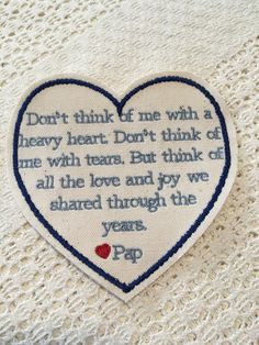 a heart shaped embroidered patch with the words don't think of me with a heavy heart, don't think of me with tears but think of me all the love and pay we shared through the years