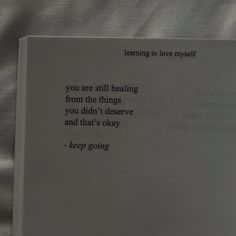 an open book with the words learning to love yourself