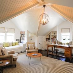 a living room filled with lots of furniture