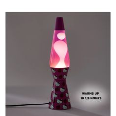 a purple lamp with hello kitty designs on it and the words warm up in 1 15 hours