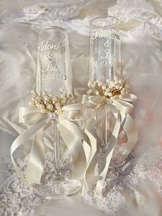 These bride and groom wine glasses make a stunning personalized gift that the happy couple will treasure for years to come! Luxury set of 2 crystal wine glasses with personalized hearts for the bride and groom. Each crystal wine glass is hand-engraved with the couple's names, delicate intertwined hearts and the wedding date. Environmentally friendly crystal glass does not contain lead compounds 100% glass ink embossed design which cannot be removed Capacity: 390ml Height: 225mm Depth: 11mm Recom Bride Groom Champagne Glasses, Engraved Wedding Glasses, Wedding Glasswear, Wedding Glasses For Bride And Groom, Gift For Wedding Couple Marriage, Wedding Wine Glasses Diy, Wine Glass For Wedding, Bride And Groom Wine Glasses, Engagement Glasses