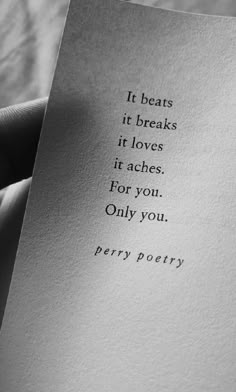 a person holding up a piece of paper with the words it beats it breaks it loves it acts, for you only you