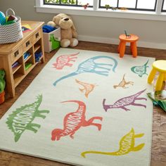 a child's play room with toys and rugs