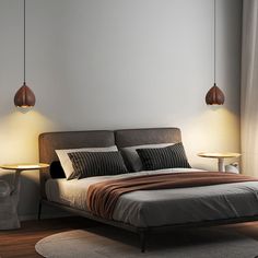 a bed with two lamps on either side of it and a rug in front of it