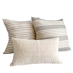 three striped pillows on top of each other with text overlay that reads, how to choose the perfect pillow for your bed