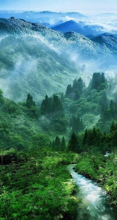 a painting of a mountain landscape with green grass and trees in the foreground is a river running through it