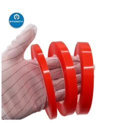 a pair of gloves with red rubber wristbands