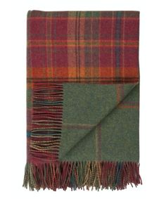 Johnstons of Elgin Lambswool Double Face Check Sofa Throw Blanket Classic Scottish Tartans transform a space with traditional charm. Reversible, soft lambswool throw blanket crafted with fiber from the Johnstons of Elgin sheep flock is intricately worked into a reversible lambswool accent throw blanket. Featuring a large tartan or windowpane on one side and a smaller tattersall or check on the reverse, this stunning blanket features an array of Scottish colors. Hand-finished fringing detail and Check Sofa, Checked Sofa, Tartan Throws, Scottish Tweed, Blanket Craft, Tartan Blanket, Wool Throw Blanket, Sofa Throw Blanket, Wool Throw