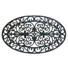 an ornate black metal tray on a white background