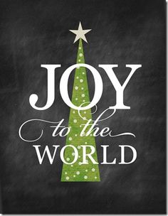 a chalkboard christmas tree with the words joy to the world written in white on it