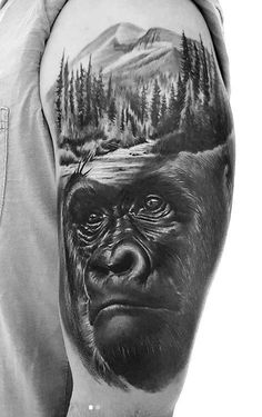 a black and white photo of a gorilla with trees on it's back shoulder