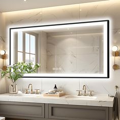 a bathroom with two sinks and a large mirror over it's counter top area