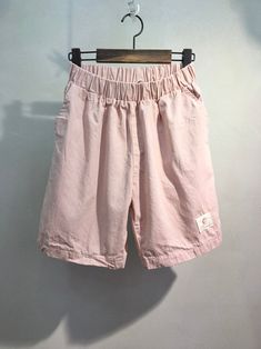 "Women's 100% cotton mid rise daily shorts with loose fit for medium sized Size One size, good for US size 4-12 Length 45cm /19\" Waist width 30cm/12\" (good up to waist size 34\") Fabric and Care Cotton 100% Machine washable and tumble dry Made in S Korea" Summer Cotton Pants With Built-in Shorts, Casual Baggy Shorts With Built-in Shorts, Solid Knee-length Shorts For Spring, Summer Knee-length Cargo Shorts With Built-in Liner, Cotton Jean Shorts For Summer, Pink Relaxed Fit Cotton Bottoms, Spring Cotton Bottoms With Side Pockets, Pink Cotton Shorts With Elastic Waistband, Cotton Bermuda Shorts With Built-in Shorts